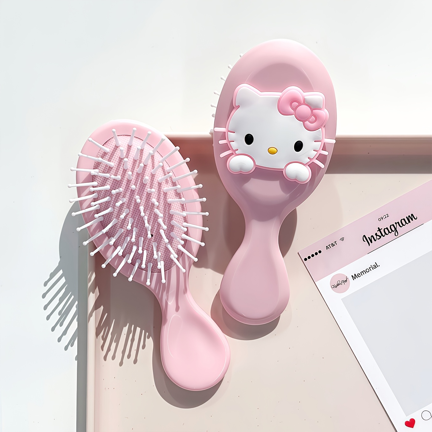 E-shop Sanrio Hello Kitty Mini tragbarer Kissenkamm – eine leichte Reise-Glättebürste für Damen, ein antistatischer Kopfhautmassagegerät, ein