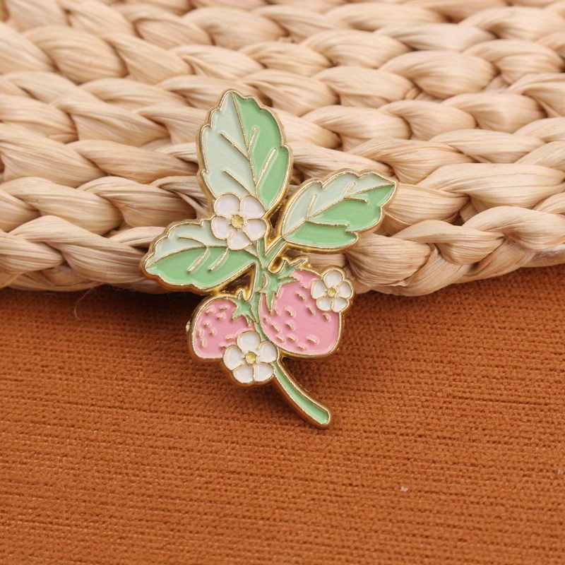 Image of Strawberry - Themed Alloy Enamel Pin - Delicate Design With Pink Strawberries, Green Leaves, And White Flowers - Perfect For And Fans Of Sweet, Rustic Aesthetics