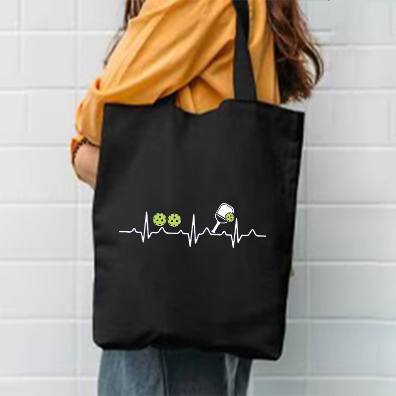 Heartbeat Pulse Pickleball Tote Bag - حقيبة كتف كبيرة قابلة للطي من قماش الكانفاس بسعة كبيرة مع خط ECG وتصميم كرة البيكلبول، قابلة للغسل في الغسالة، بيج، حقيبة للتنقل العارضة للنساء والرجال، حقيبة حمل متعددة الاستخدامات، حقيبة رسومات لطيفة، حقيبة بمقبض متين