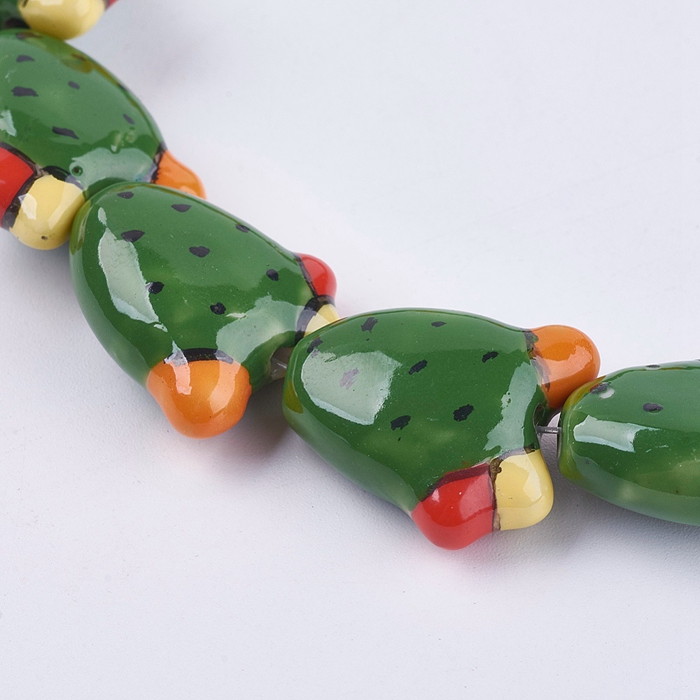 TEMU 1 pieza de cuentas de porcelana artesanales con forma de cactus, color verde, medidas de 21X19X9 mm con un tamaño de orificio de 1.5 mm, ideal