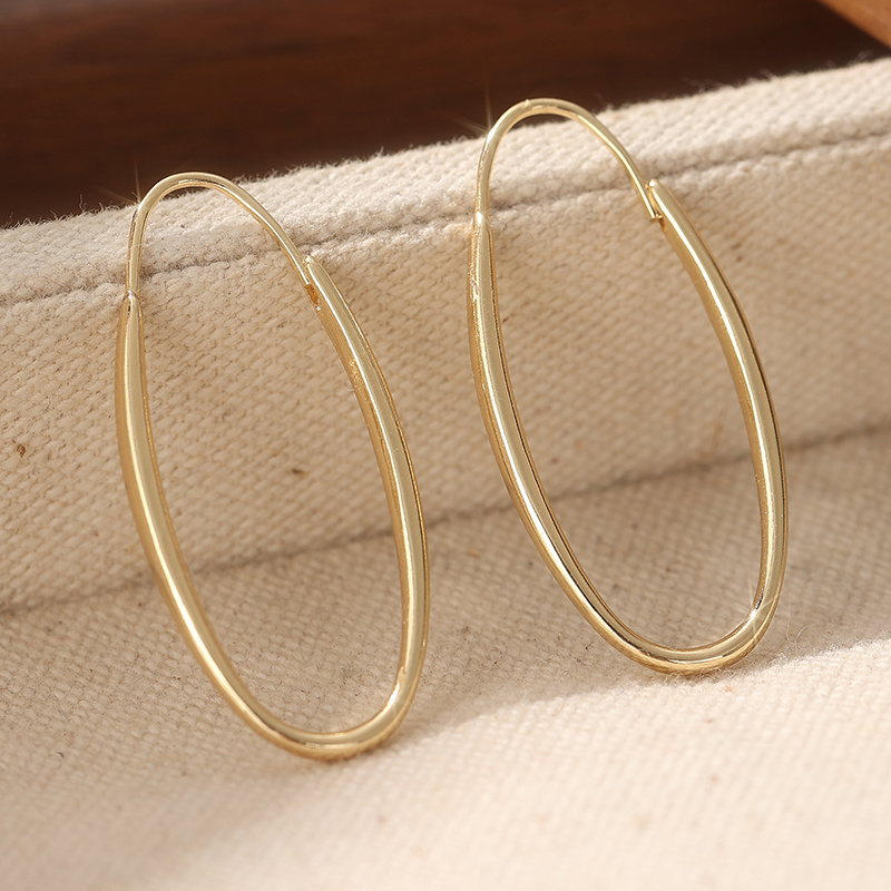 TEMU 1 Par de Aretes Clásicos Ovalados con Diseño Minimalista, Presentando Líneas Suaves como de Agua, Ofrecen un Estilo Moderno que es a la Vez