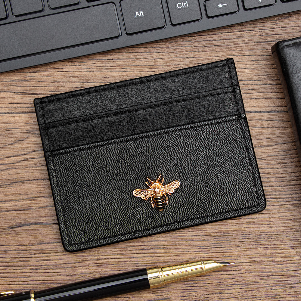 Image of A Cardholder Featuring A Small Bee Motif, Designed In A European And , With Slots For Cards, Making It Ideal For Anyone. It Serves As A Compact Coin Purse With Card Compartments