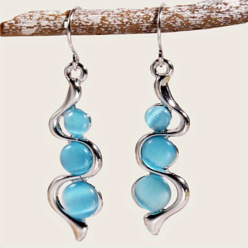 Women's Earrings In A Bohemian Ethnic Style, Featuring Silvery Curved Waves And With Light Blue Drops, Gatherings