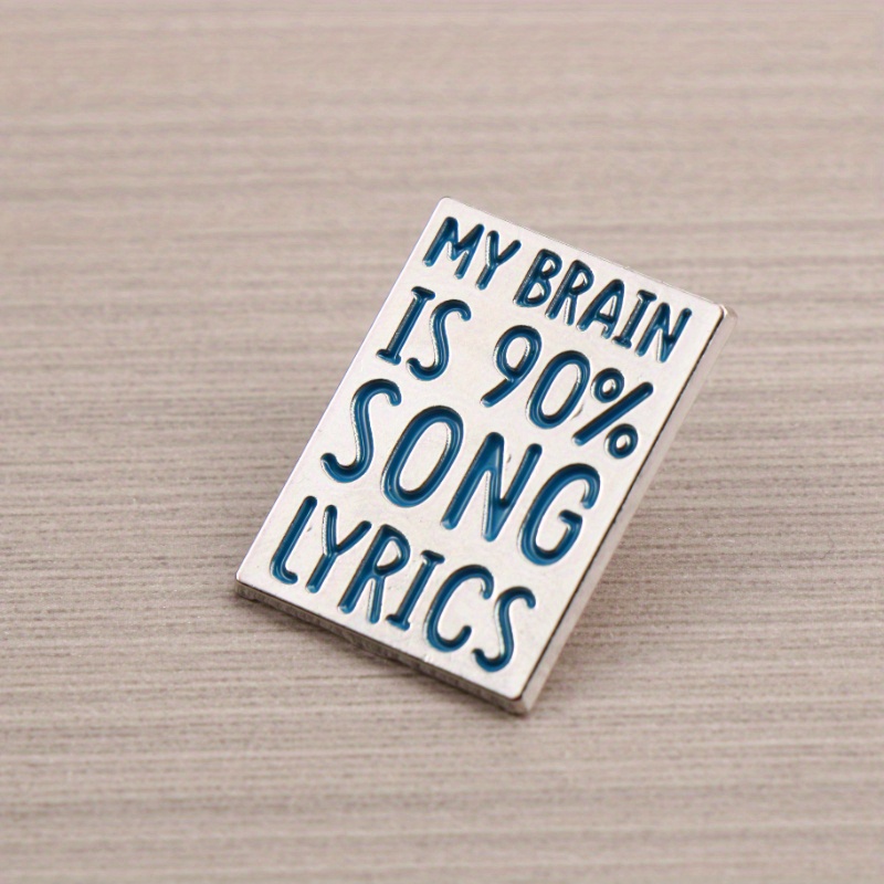 Image of Music-lover Humor Theme Pin—features “ Is 90% Song Lyrics, ” Humorously Exaggerating A Music Enthusiast' Brain Filled With Lyrics