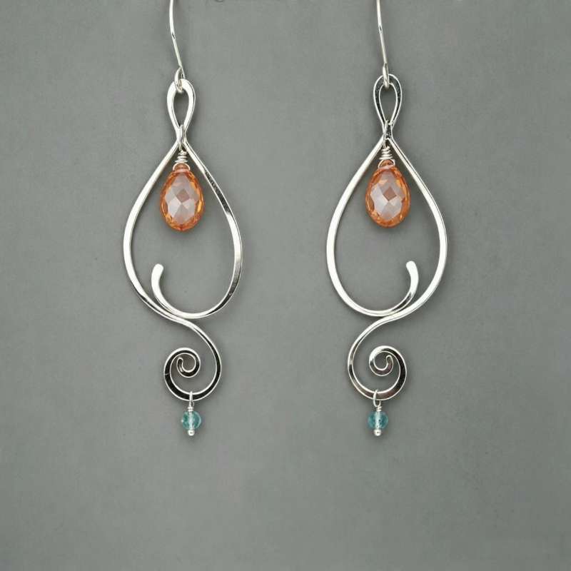 Hollowed-out Teardrop Silhouette Earrings with Synthetic Zirconia