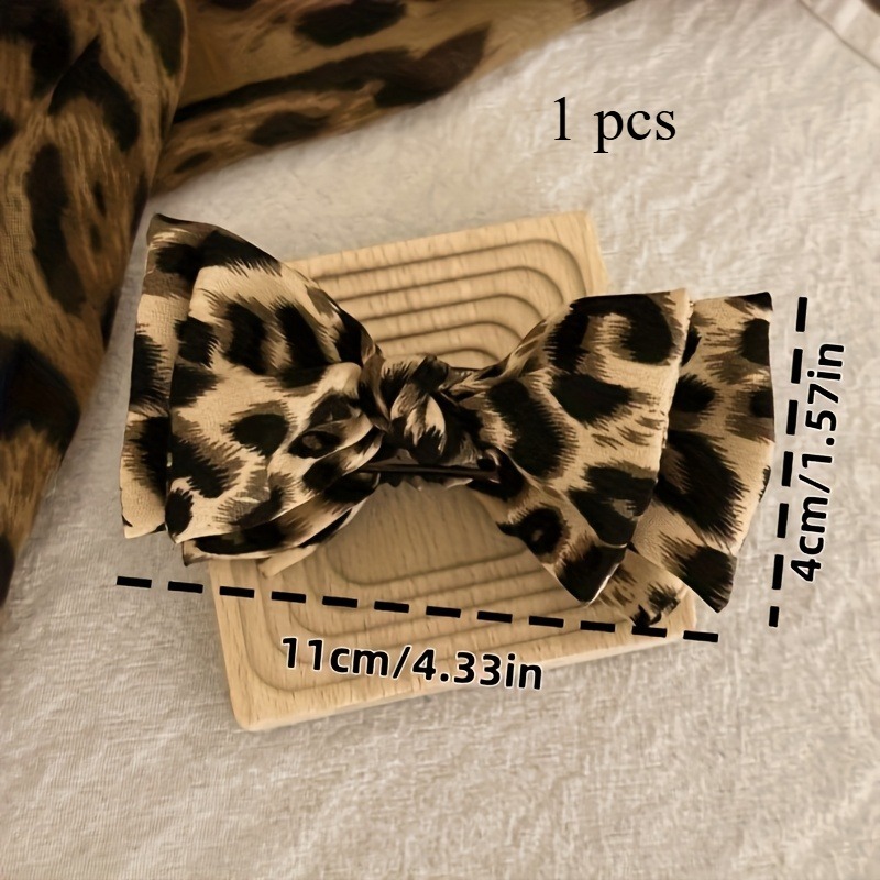 Image of 1 Leopard Print Bow Bun Claw Clip, High Ponytail Hair Clip, Shark Clip, Hair Accessory, Super , Suitable For Women's Hair, For Daily And Special Occasions, Compact And Lightweight, , Secure Hold