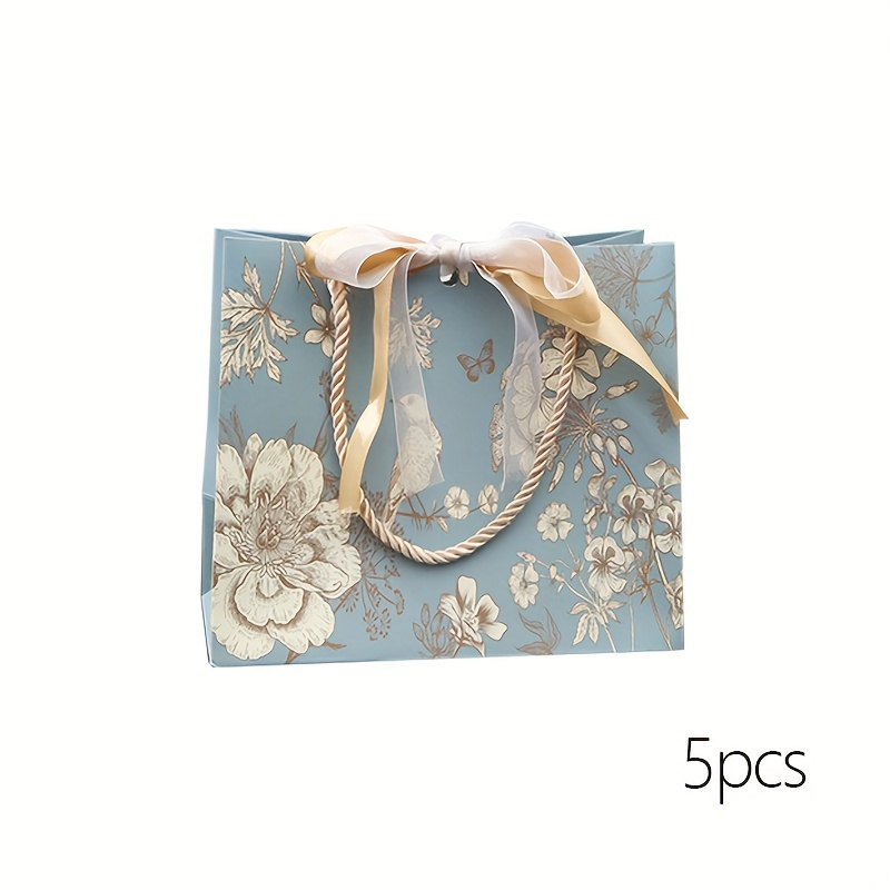 E-shop 5 Stück Elegante Blumen-Geschenktaschen mit Reißverschluss-Handhaben - Pastellblau & Goldener Design, für die Verpackung von Damenbekleidung,