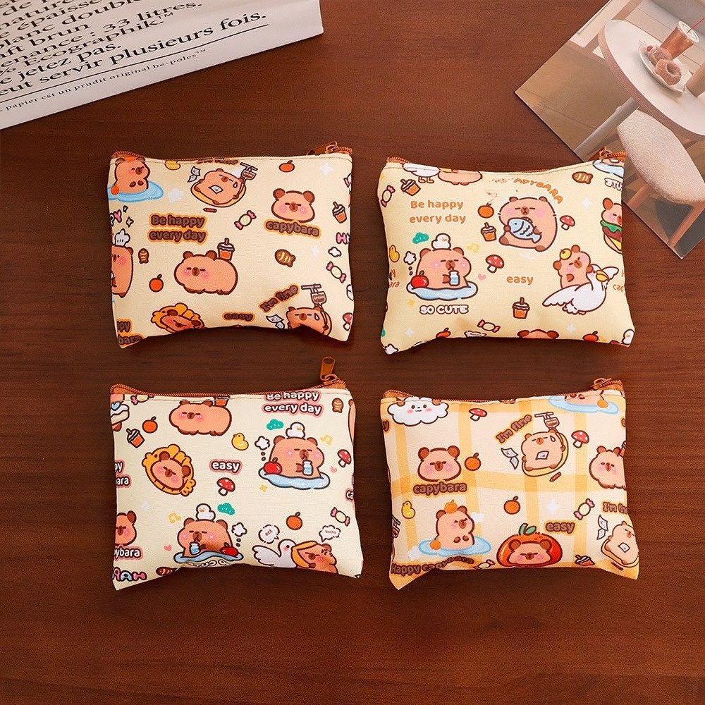 E-shop Set mit 4, zufällig ausgelieferte Styles, hochwertige Capybara Münzfach, niedliche Mini-Ohrhörer-Lippenstift-Tasche, tragbare