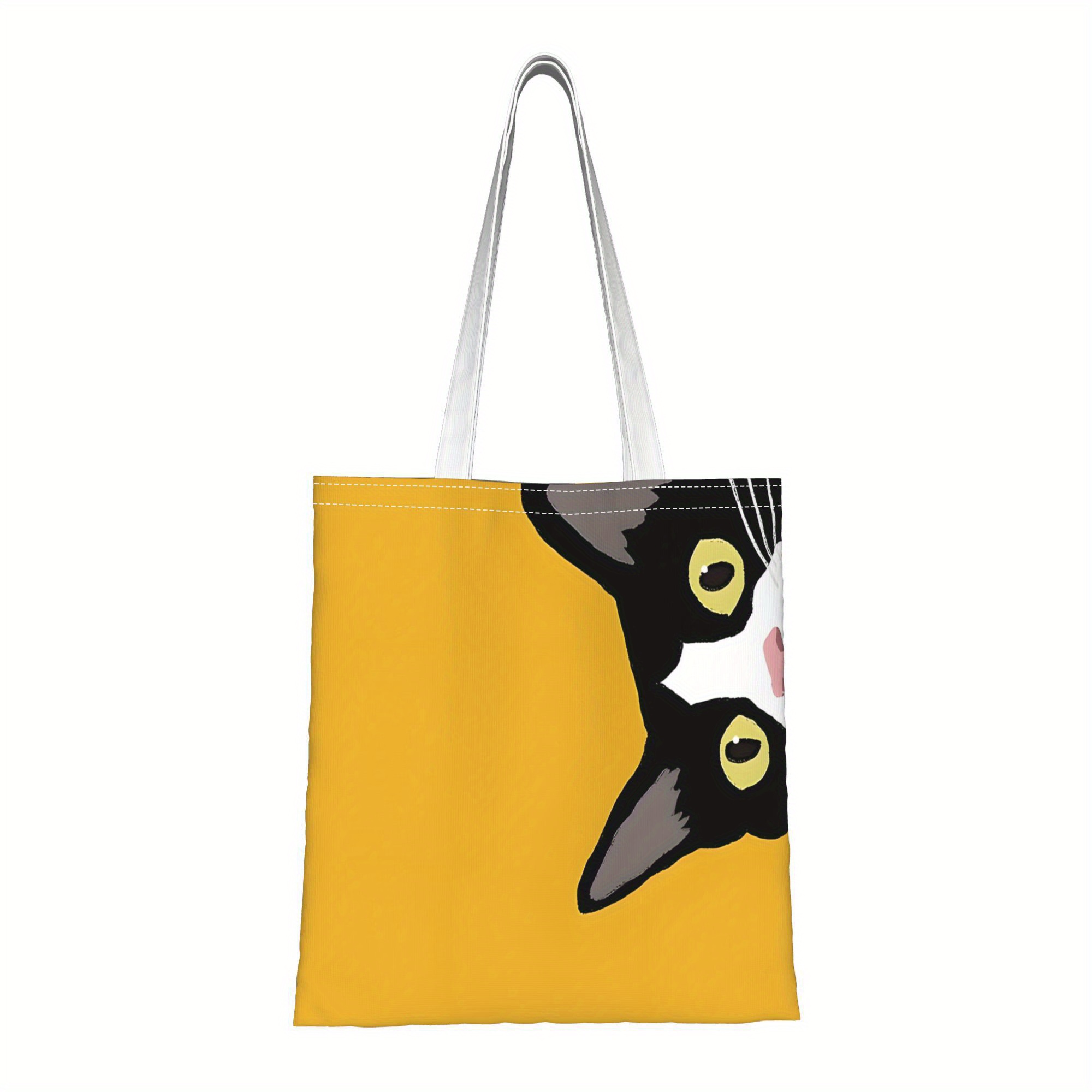 TEMU 【商品名】毎日あなたを観察する猫が特徴の愛らしいトートバッグ。持ち手付きでショッピングに最適。