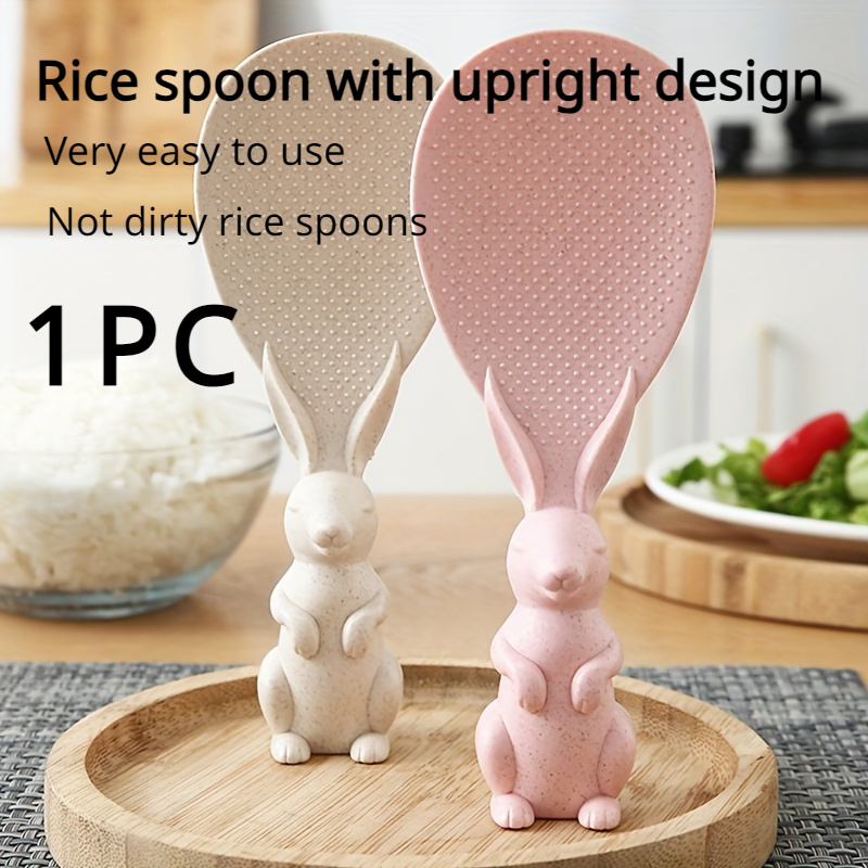 Una adorable cuchara para arroz con forma de conejito que se mantiene de pie - Hecha de plástico de calidad alimentaria antiadherente y resistente al calor, perfecta para reuniones familiares y eventos al aire libre