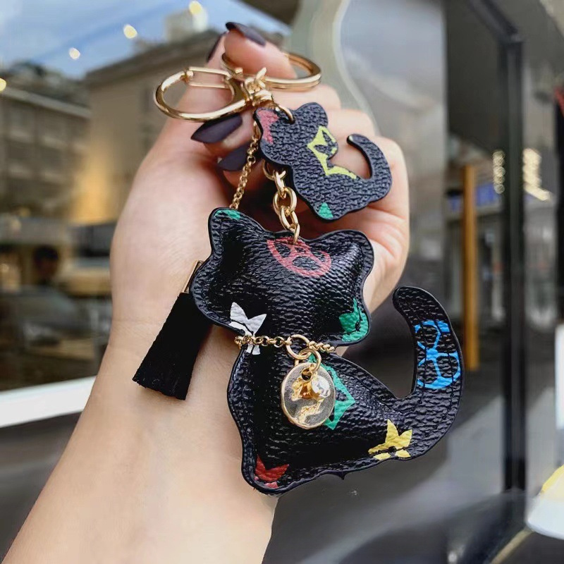 

1 Set Cat Keychain And ,