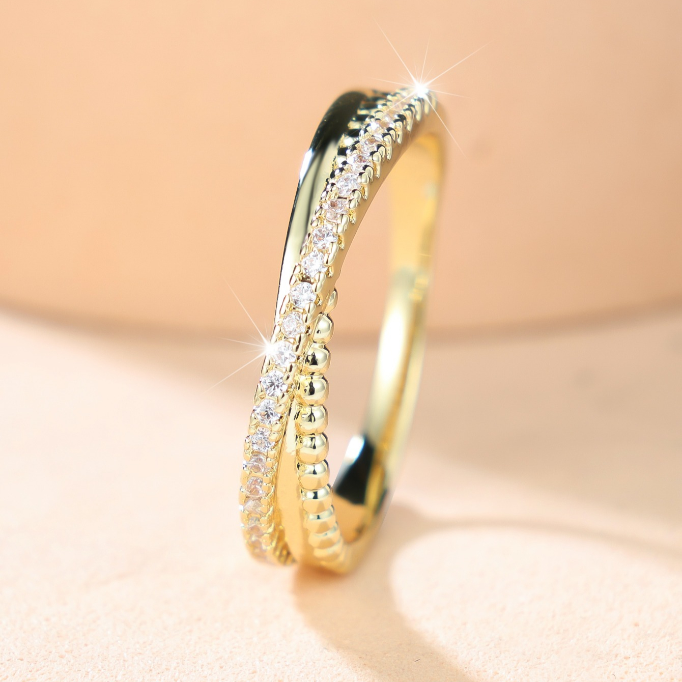 Elegant Golden Tone Pave Zirconia Ring, Twisted Design