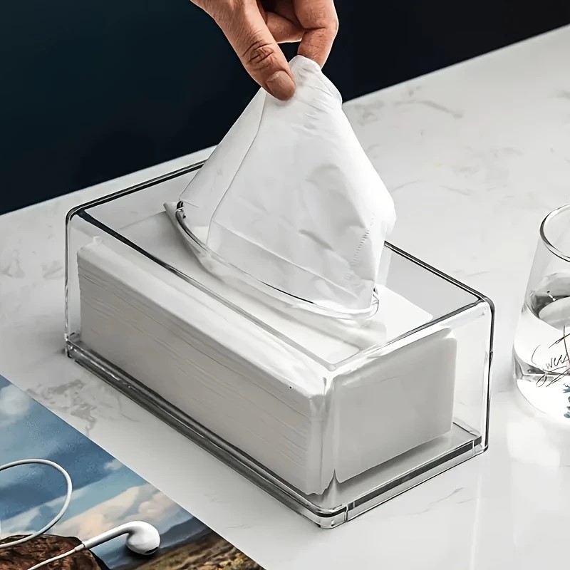 a modern transparent acrylic tissue box cover with a  , featuring a smooth tissue outlet, suitable for decorating bath  and living  . Product details 4