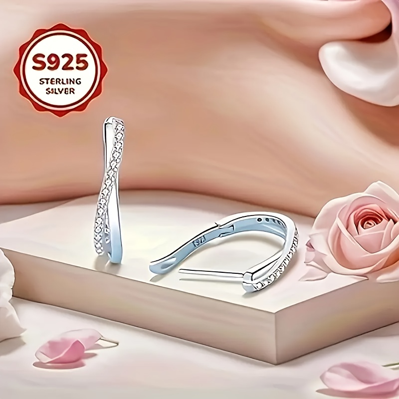 TEMU Une paire de boucles d'oreilles argentées brillantes torsadées à double couche pour femme, hypoallergéniques, adaptées à tous les de peau beige