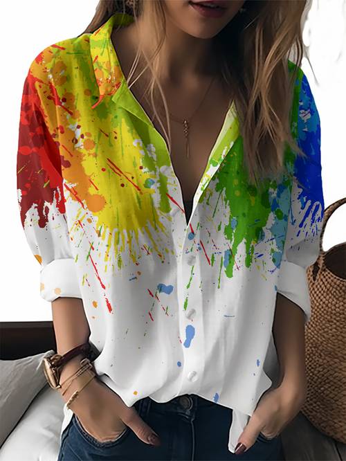 a stylish button up shirt for women featuring a long sleeve design with an artistic pattern of colorful paint