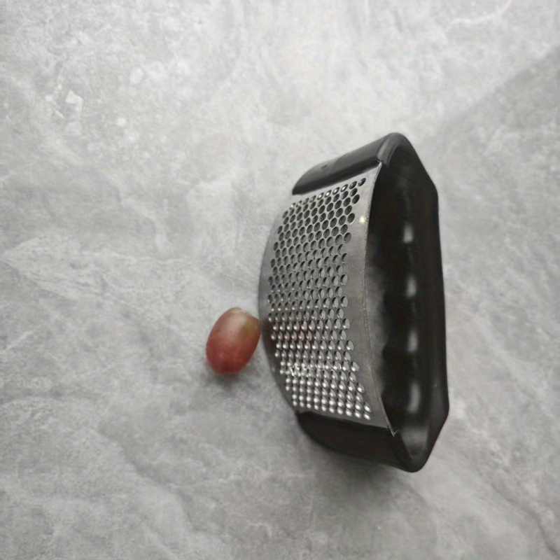 TEMU A Stainless Steel Garlic Press - A Manual Garlic Grinder And Crusher With A Metallic Structure, Power-free Operation, And Essential For Dormitory And Household Kitchen Use.