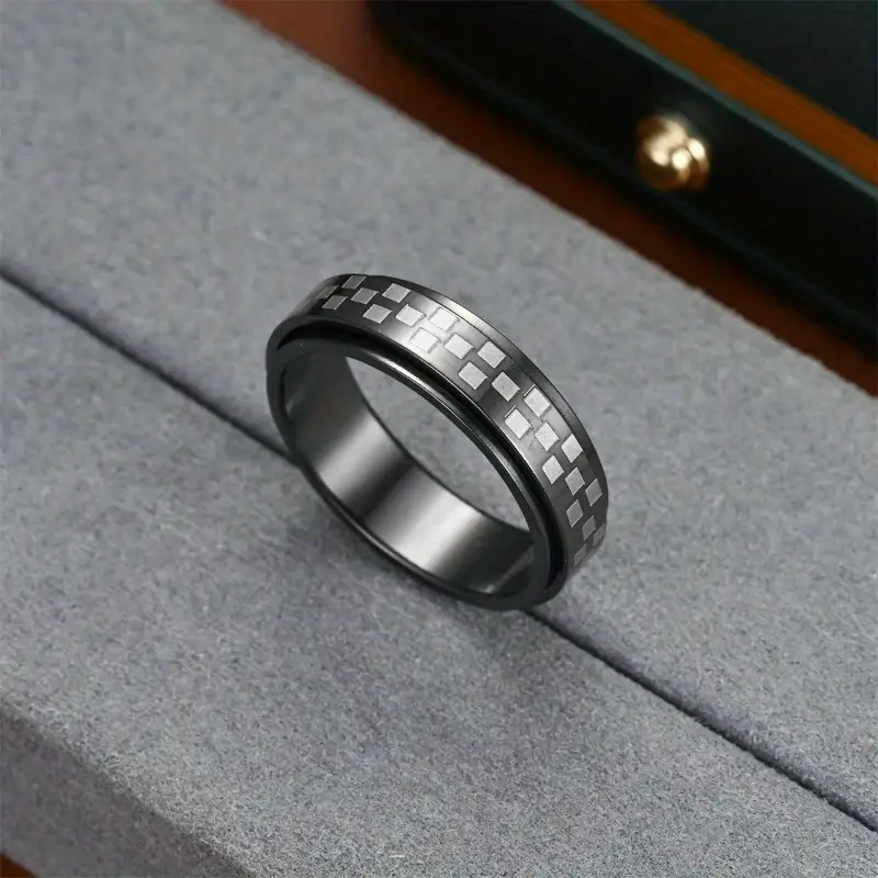 a stylish new mens ring with a unique european and american design featuring a resistant oil coated rotatable small checkered mosaic pattern its a versatile accessory durable and suitable for everyday wear or as a gift Product details 4