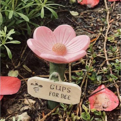 3 a flower shaped bee drinking station with a non slip texture design suitable for decorative garden stakes for like insects bees and butterflies outdoor gardens and patio decor