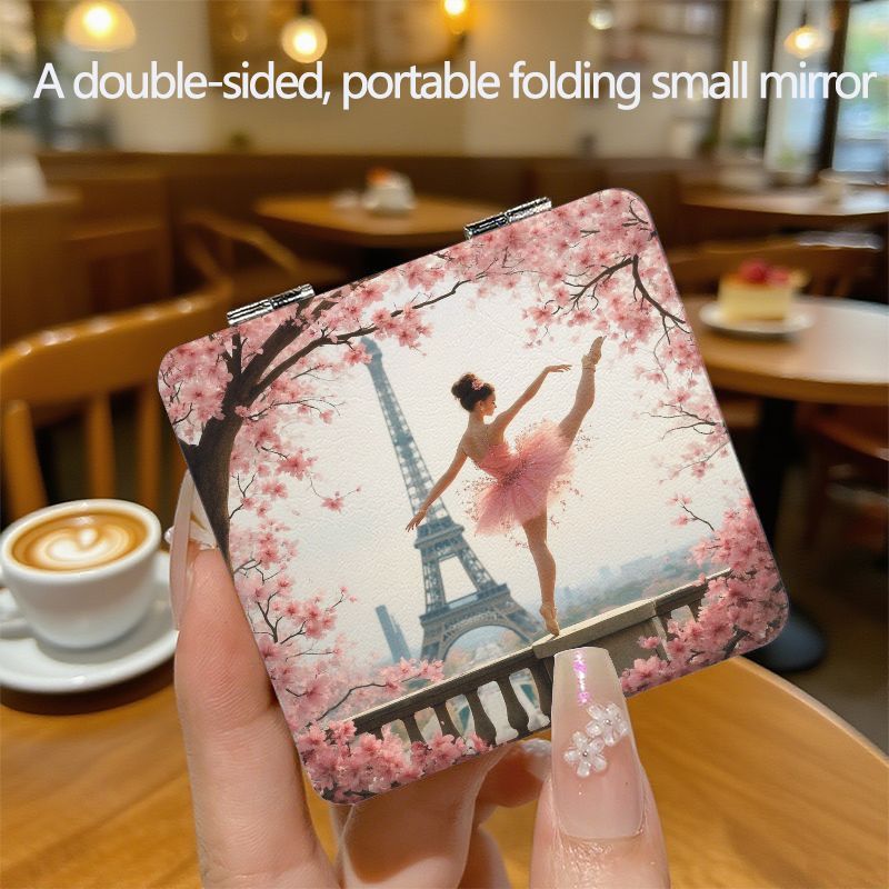 Compact Mirror Featuring A Ballet Dancer And Tower - A Double-sided Folding Cosmetic Mirror, Perfect For Travel, With…: retailer-supplied image