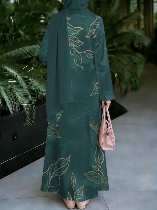 vestido maxi muçulmano verde-escuro com estampa de folhas com dourados, de comprida e de , adequado para adoração, reuniões e passeios. esta nova coleção um vestido muçulmano longo , porém , com um de folhas lisonjeiro que disfarça o