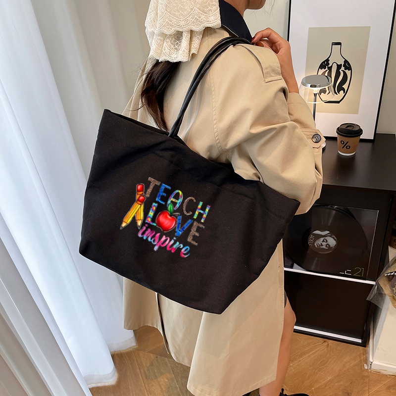 item picture large capacity tote bag with teacher themed print fashionable casual shoulder handbag korean style ins inspired commuter bag simple and versatile   bag made of wear resistant material sturdy and durable the   interior can