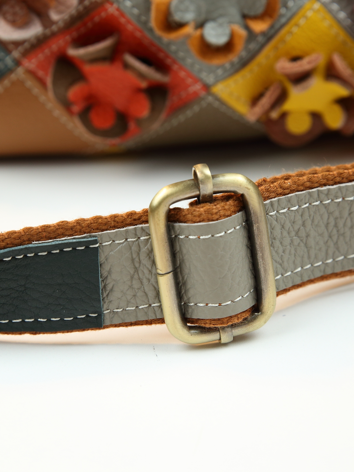 Back view of floral print leather bag