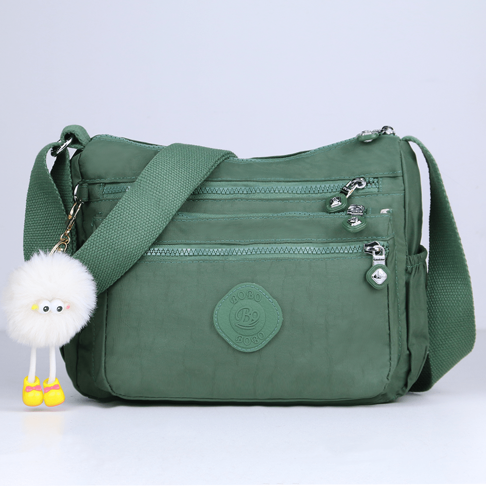 stylish lightweight multi pocket unisex crossbody bag with pendant elegant durable womens shoulder bag sturdy anti theft womens crossbody bag durable fabric multiple compartments adjustable straps perfect for travel daily use commuting Product details 18