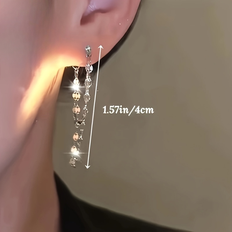a pair of elegant earrings with double layer chains and tassels suitable for gift   and daily wear classic daily jewelry accessories holiday and birthday gifts anniversary gifts   Product details 6