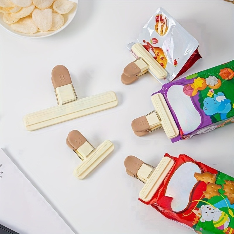 4pcs 2 small 2 large clip multifunctional storage sealing clip moisture proof and dust proof airtight clip suitable for   plastic bags and snack bags kitchen organization and storage   Product details 1
