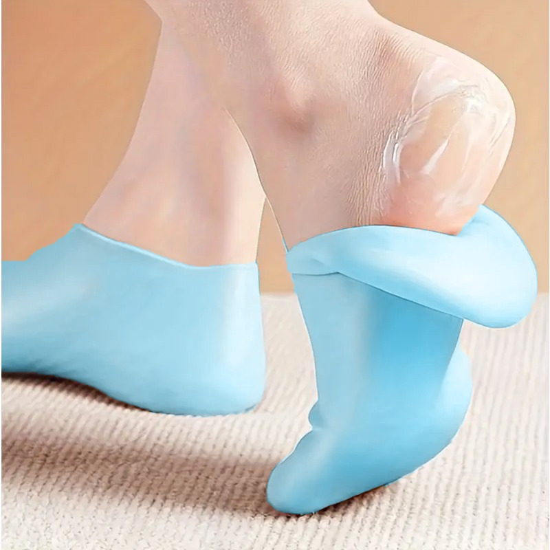 a pair of silicone moisturizing socks designed for dry cracked heels and rough skin suitable for   men and women     care socks help soften the feet and make a great gift for mothers day christmas or ramadan