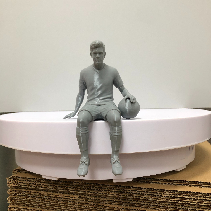 TEMU Seated Football Player Decorative Ornament, Hand Holding A Football, Suitable For Football , Gyms, Sports Training Rooms, And Reception Desks As