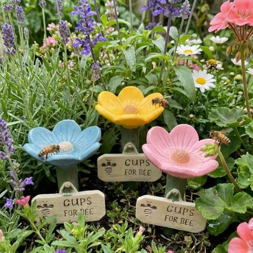 3 a flower shaped bee drinking station with a non slip texture design suitable for decorative garden stakes for like insects bees and butterflies outdoor gardens and patio decor