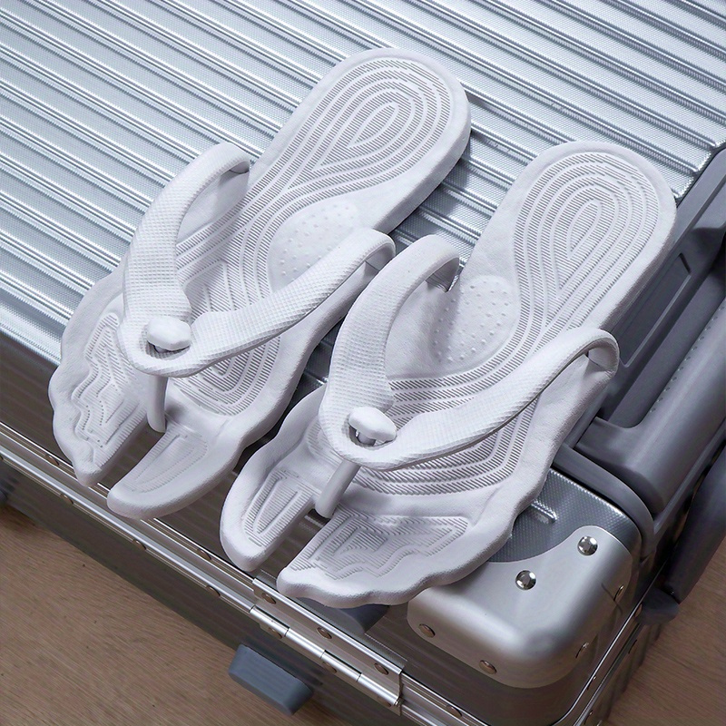 un par de zapatillas plegables portátiles para viajes y viajes de negocios, chanclas de playa para pareja, zapatillas de baño antideslizantes para hotel Detalles del producto 2