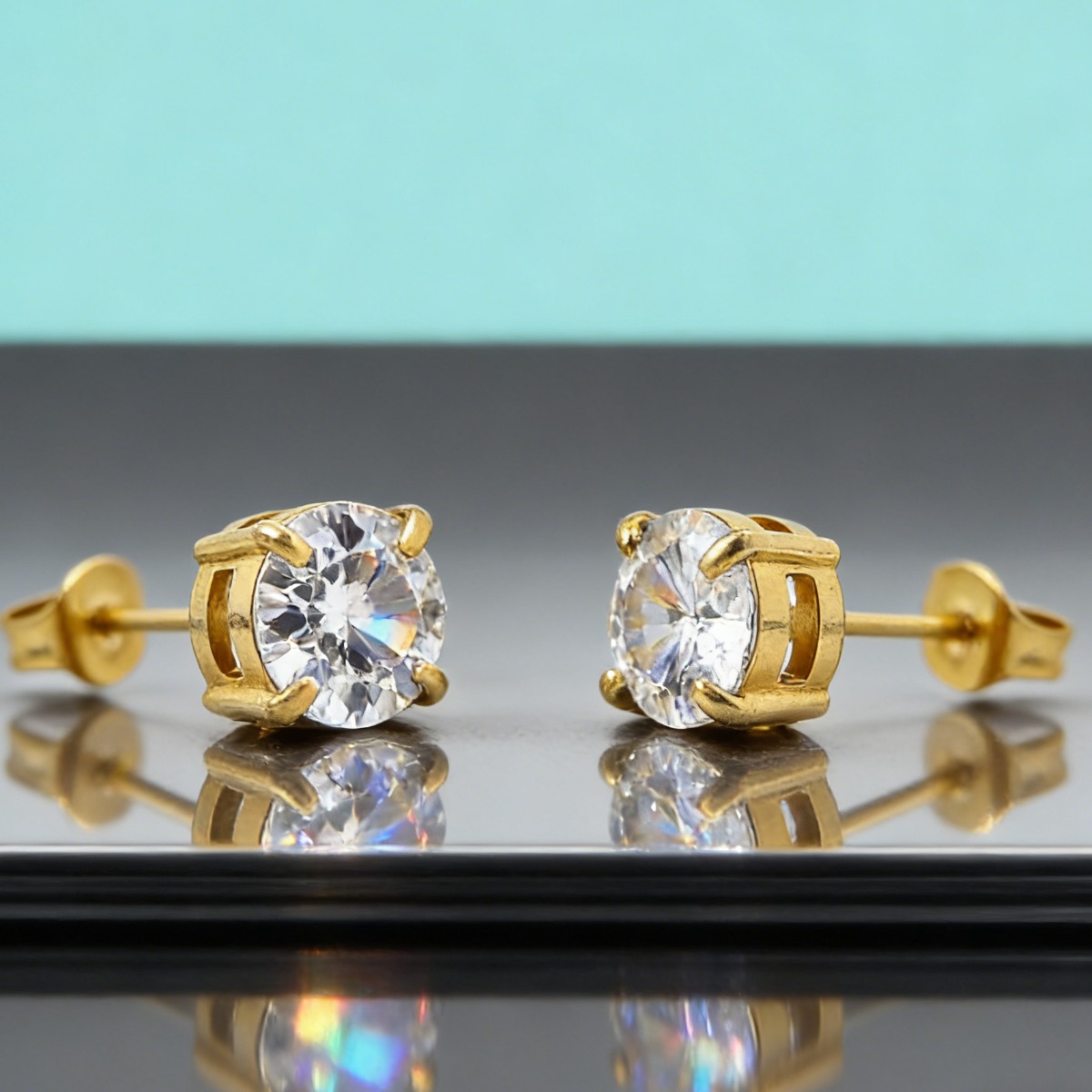 Chic Round Cut Moissanite Four-Prong Golden Stud Earrings