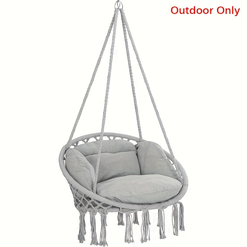 a bohemian style outdoor hammock chair set   camping and travel featuring one cushion this ethnic style hanging chair is comfortable and portable designed for easy assembly and made from heavy duty materials suitable for camping
