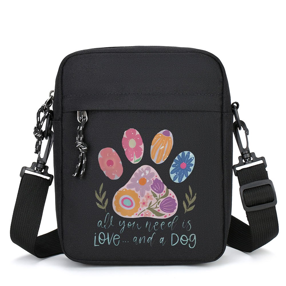 E-shop Eine stylische und praktische schwarze Umhängetasche mit floralen Pfotenabdrücken, für den täglichen Arbeitsweg und als Geschenk, mit großem