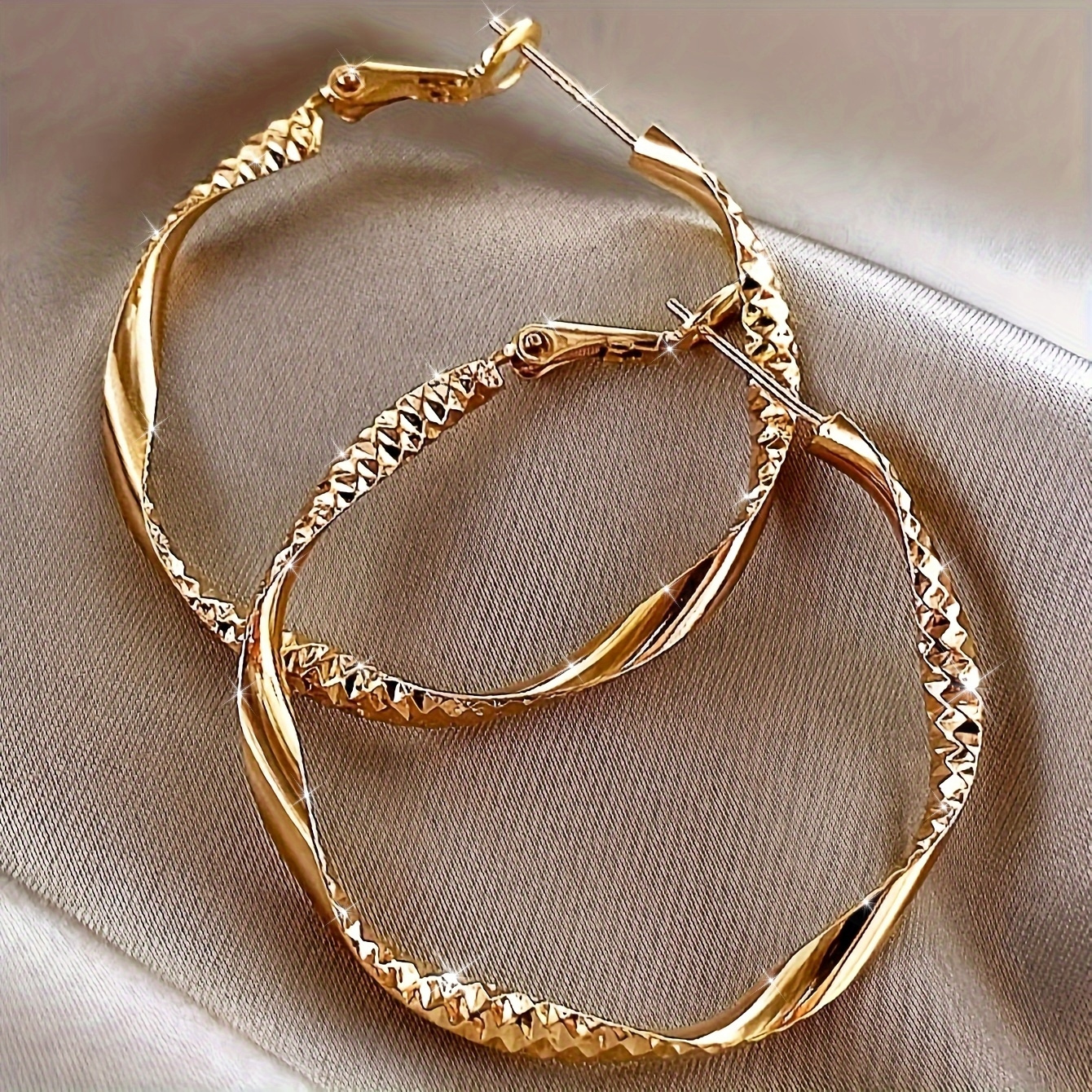Image of Women's Golden Twisted Hoop Earrings - Elegant Textured Design With Sparkling Accents, Alloy And Stainless Steel Ear Posts, Perfect For Casual Wear Or Parties, Quirky Earrings