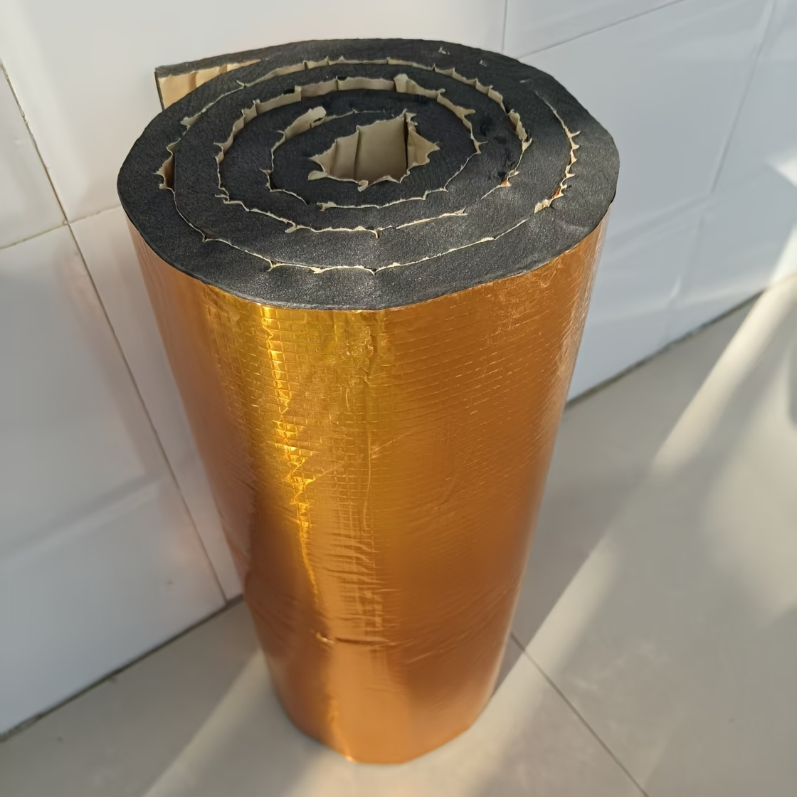 a single roll of   2cm thick self   high density insulation foam ideal for soundproofing and heat reduction in roofs and bedrooms measuring 2cm by 50cm by 200cm   one piece of   foil for sound insulation