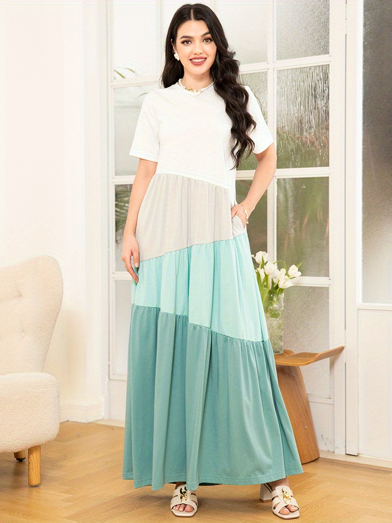 فستان ماكسي أنيق بتصميم كتل الألوان مع جيوب لياقة دائرية