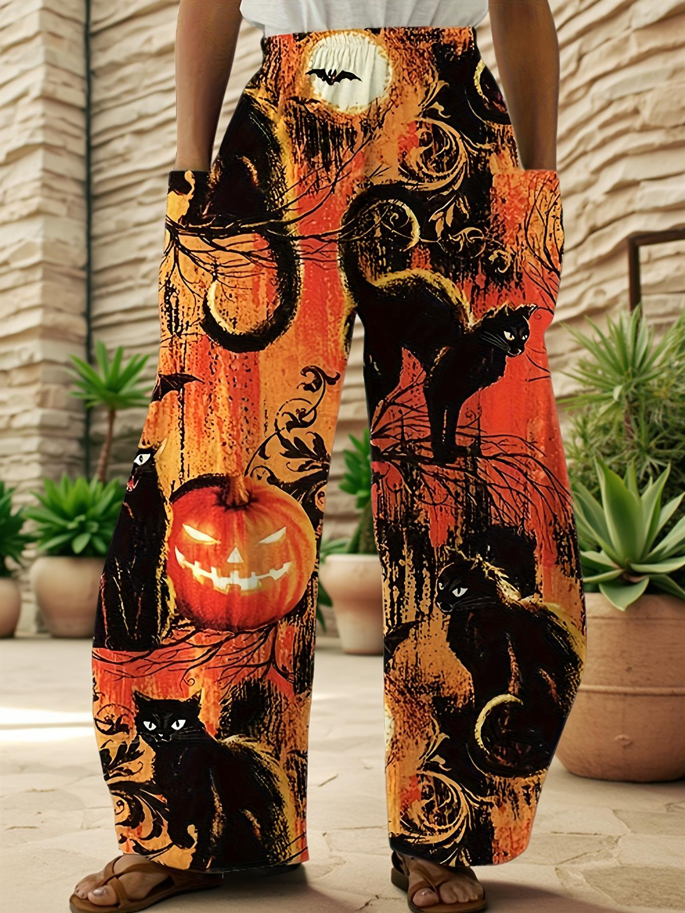 ladies halloween themed leggings featuring a full   of a black cat bats and pumpkins complete with a   pocket   loose fit straight leg trousers are perfect for parties casual   and themed celebrations