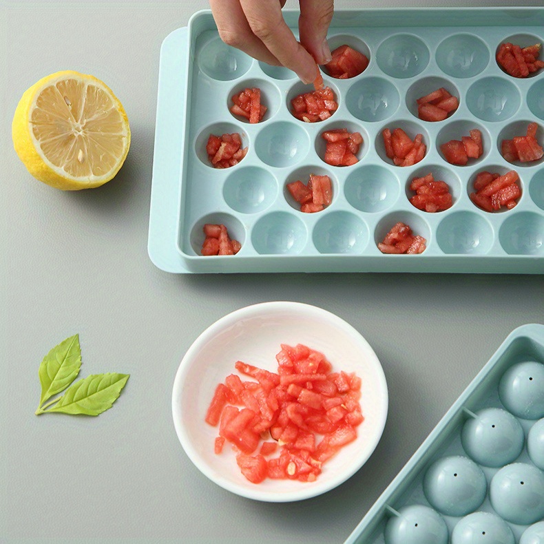 set of 2   molds designed for making ice hockey shapes featuring a 33 grid design this innovative   mold   with a lid making it a must have for   preparation and cold beverage accessories   details 2