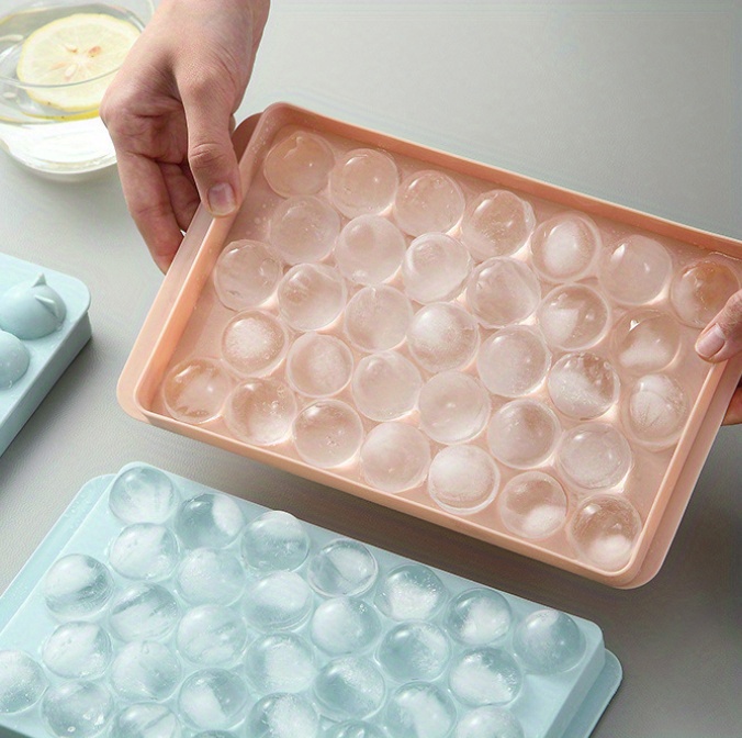 set of 2   molds designed for making ice hockey shapes featuring a 33 grid design this innovative   mold   with a lid making it a must have for   preparation and cold beverage accessories   details 8