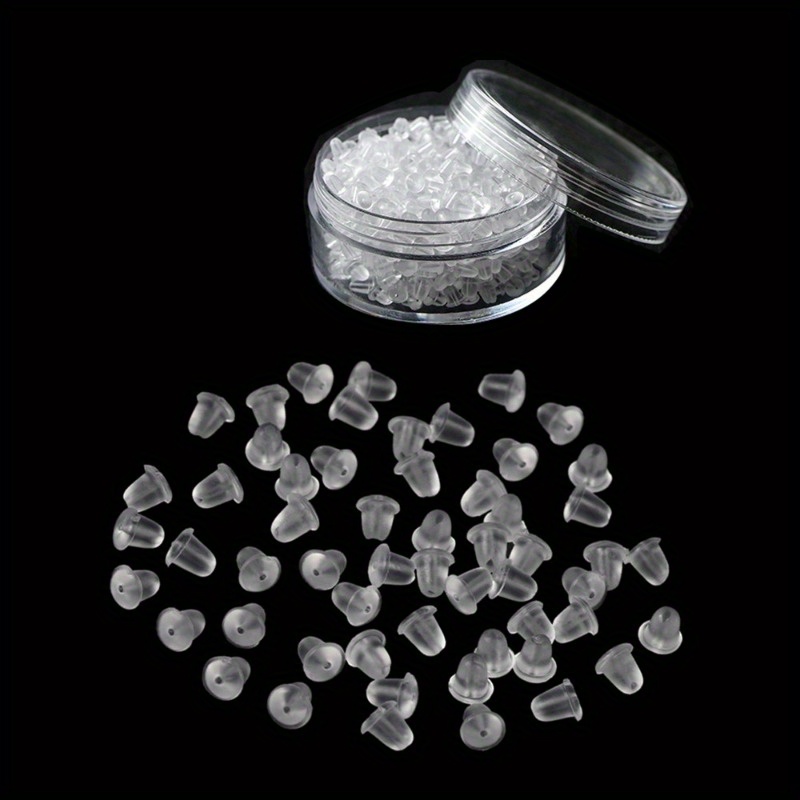 

Approximately A Package Containing Soft, Clear Silicone Earring Backs, Made From Hypoallergenic Rubber, For Stud Earrings, Serving As Replacement Stoppers.