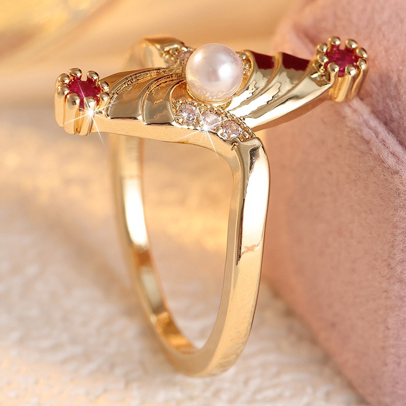 Wing-Shaped Plated Ring with Rose Red Synthetic Zirconia