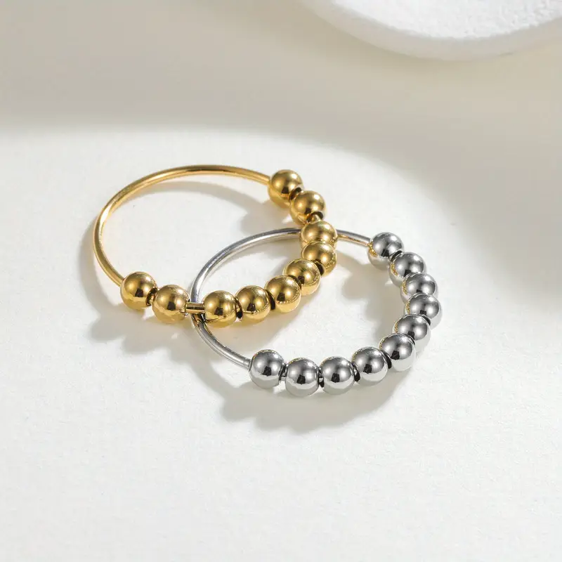 201 stainless steel ring suitable for and silvery golded thumb ring with bead rotating ring to relieve stress anxiety fidget jewelry ideal gift size 6 11 for teenager Product details 0
