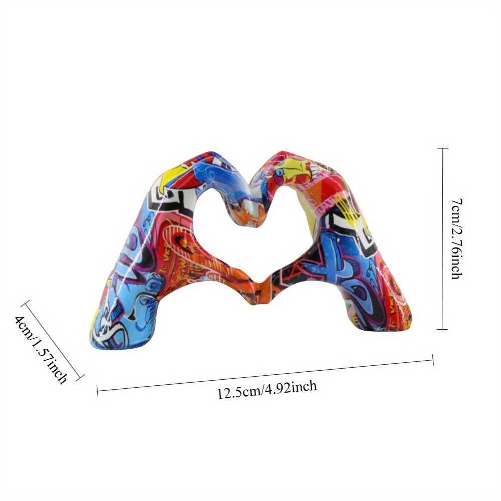 Image of A Creative Water Transfer Printed Heart-shaped Hand Ornament, A Graffiti Gesture Statue For Home Decor, Perfect For The Living Room Tabletop