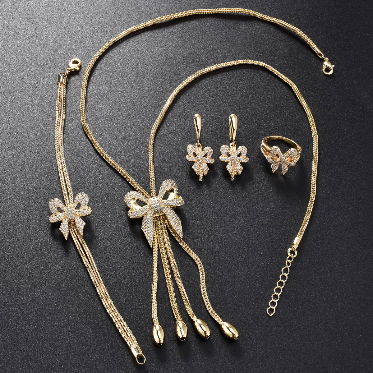 un ensemble de bijoux l   et styl pour femmes orn dun   n ud et     pendentif d cor de strass cubiques comprenant une cha ne un bracelet des boucles  illes et un anneau parfait pour   les f tes et   cadeau de la     7