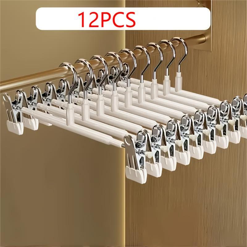 12 adjustable clothes hangers with clips non slip space saving metal hangers for pants skirts and all garments   clothes tidy and organized
