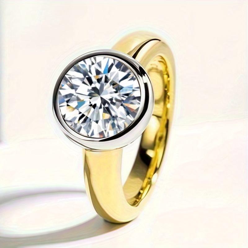 Image of A New 14k Gold-plated 925 Silver Ring Featuring A Round Moissanite In 1 Carat, 2 Carat, Or 3 Carat Sizes, Designed For Men And Women. It Boasts A Fashionable And Style With A Unique And
