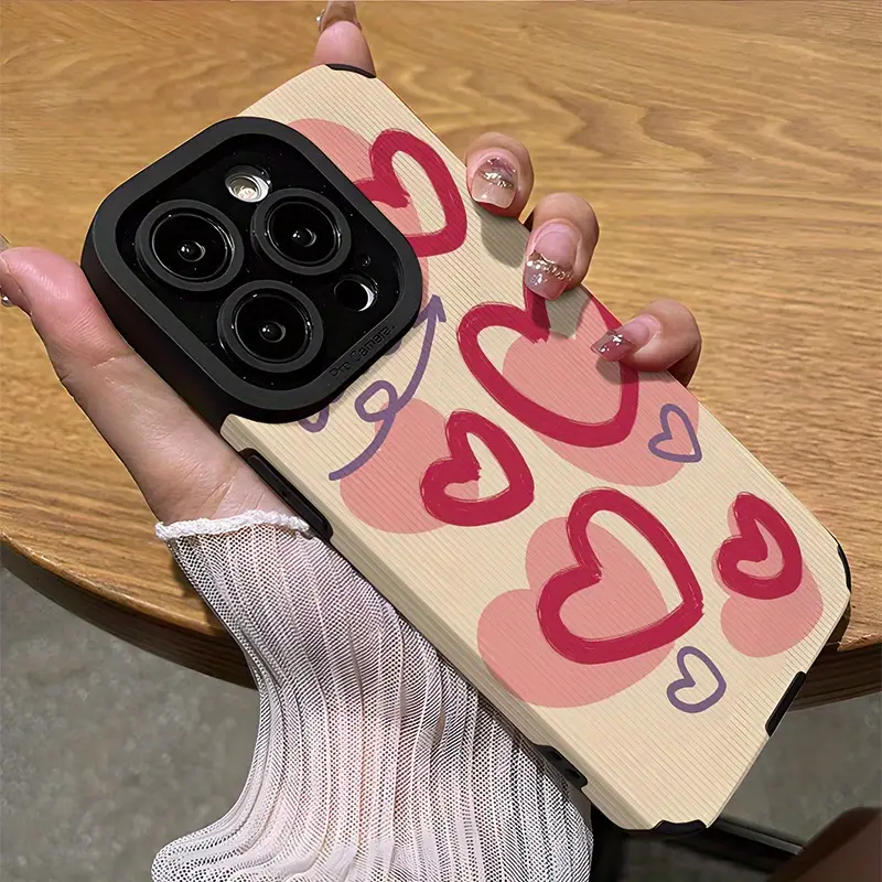 Foto de Funda con diseño de patrón de corazón rosa.